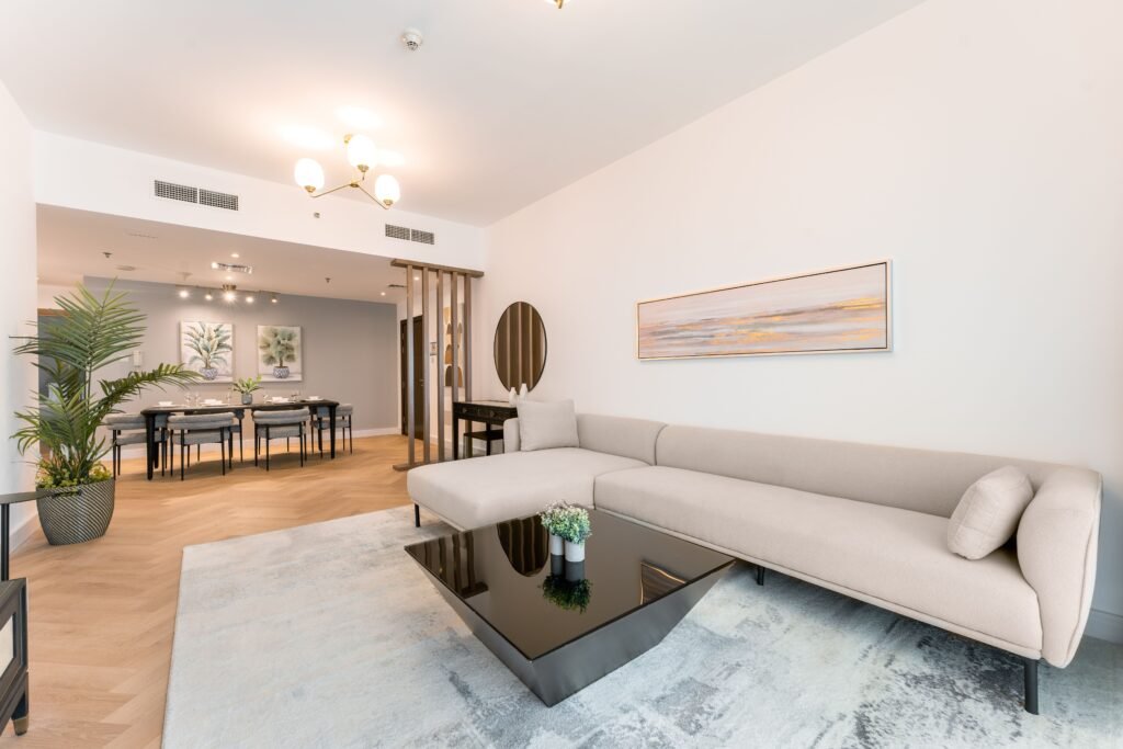 Stylish and modern living room with beige furniture and sleek decor, perfect for contemporary homes.